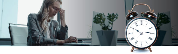 Stressed Worker with Clock