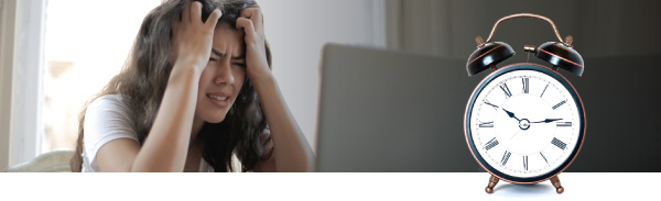 Stressed Worker With Clock