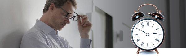 Stressed man with Clock